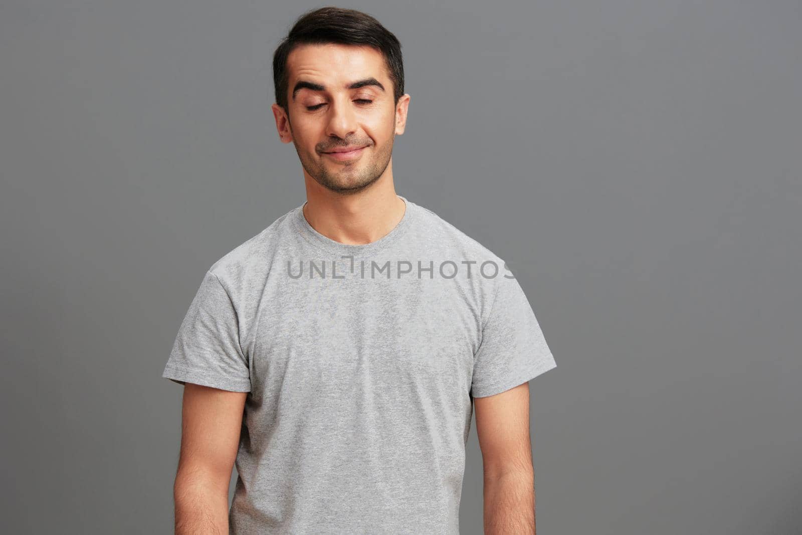 Cheerful man posing lifestyle smile studio isolated background by SHOTPRIME