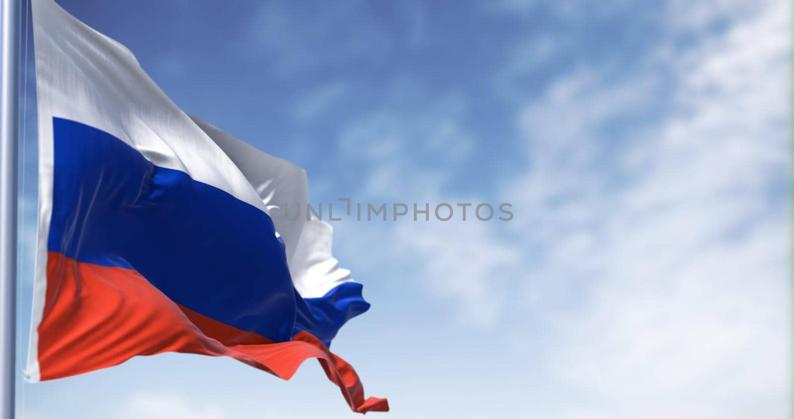 Detail of the national flag of Russia waving in the wind in a clear day by rarrarorro