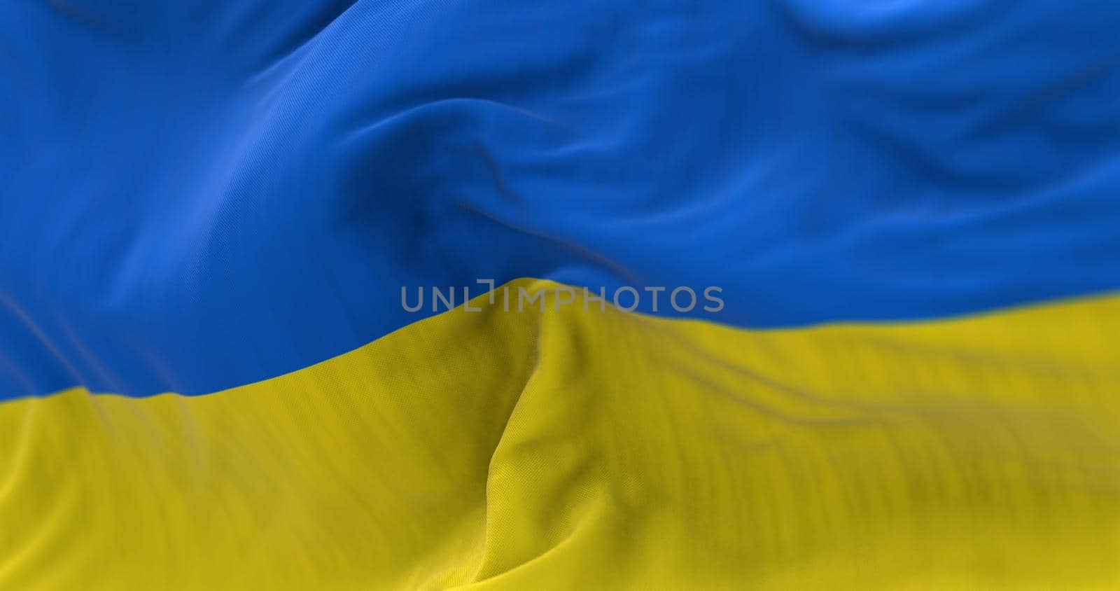 Detail of the national flag of Ukraine waving in the wind. Democracy and politics. Patriotism. Selective focus. Seamless Slow motion