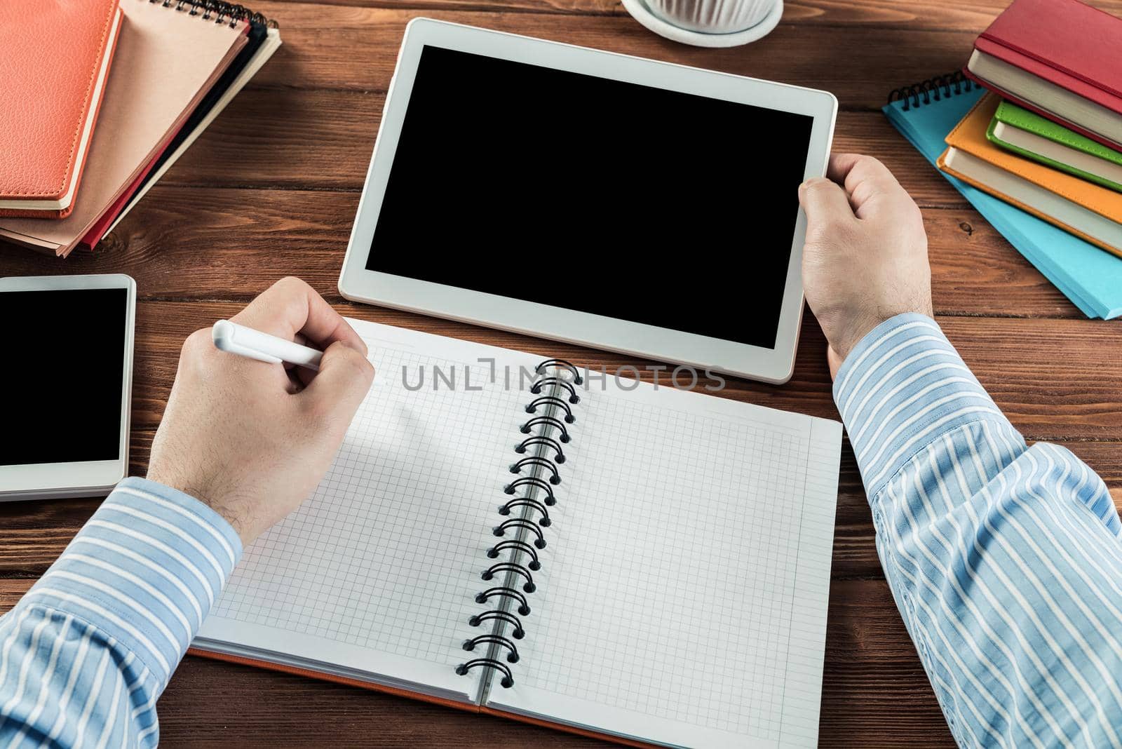 close-up of hands with notepad. office work