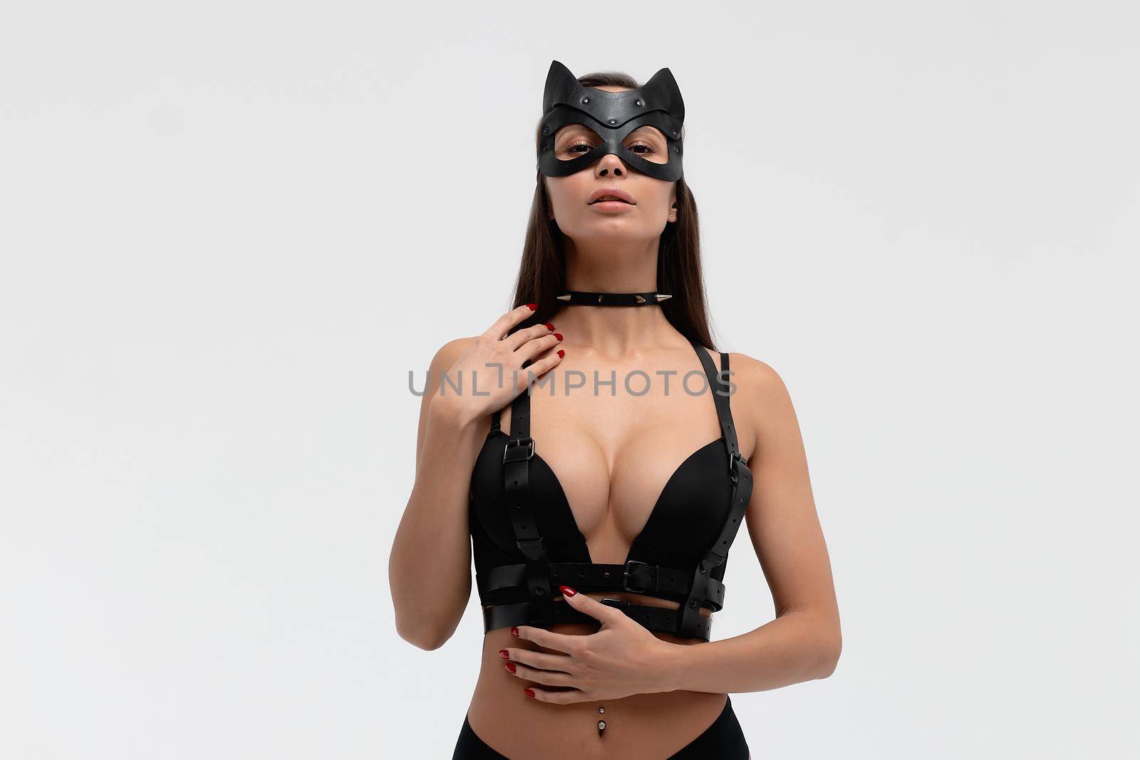 Sexy woman in black mask and lingerie in studio by 3KStudio