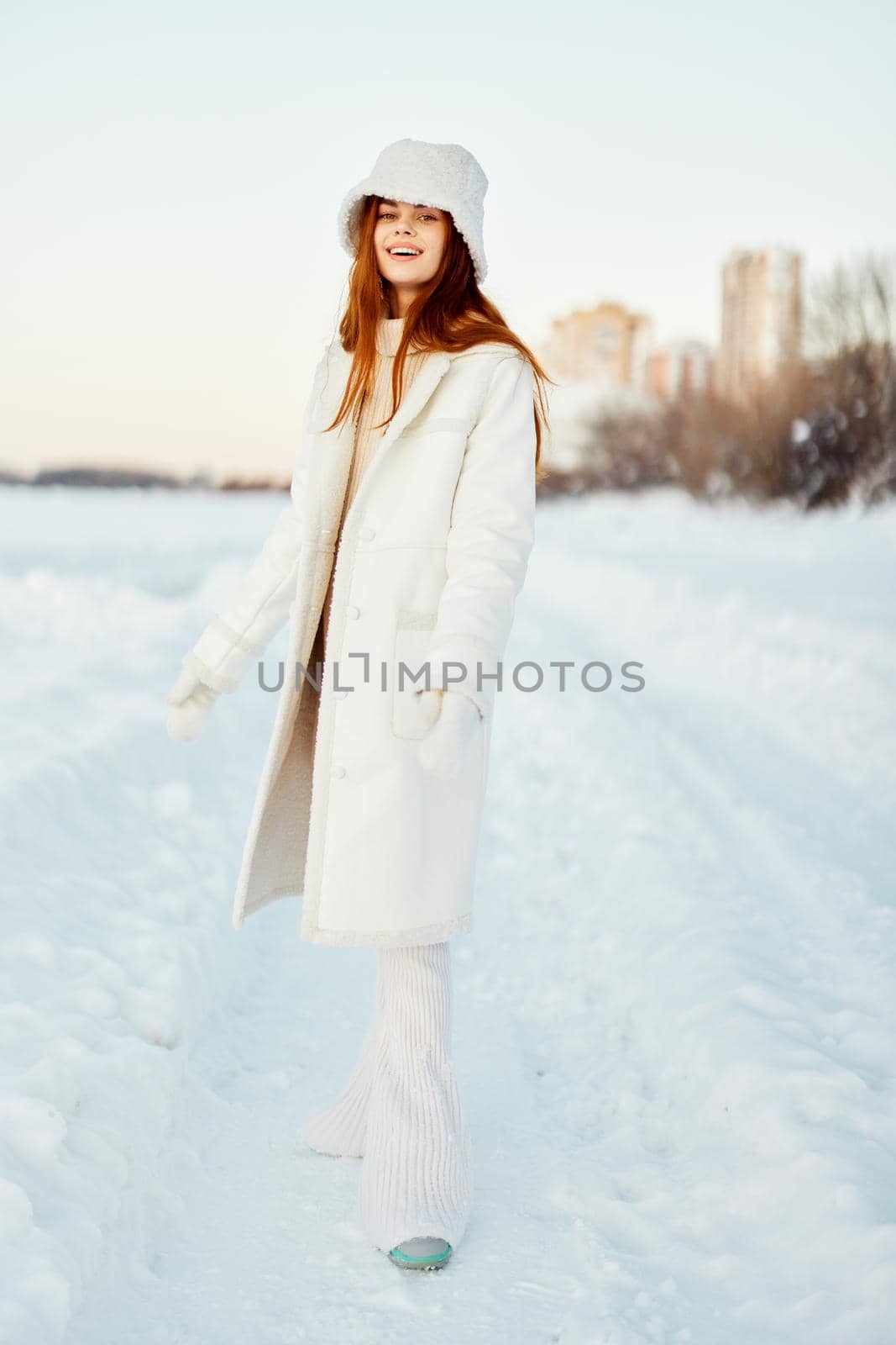 pretty woman winter clothes walk snow cold vacation Lifestyle. High quality photo