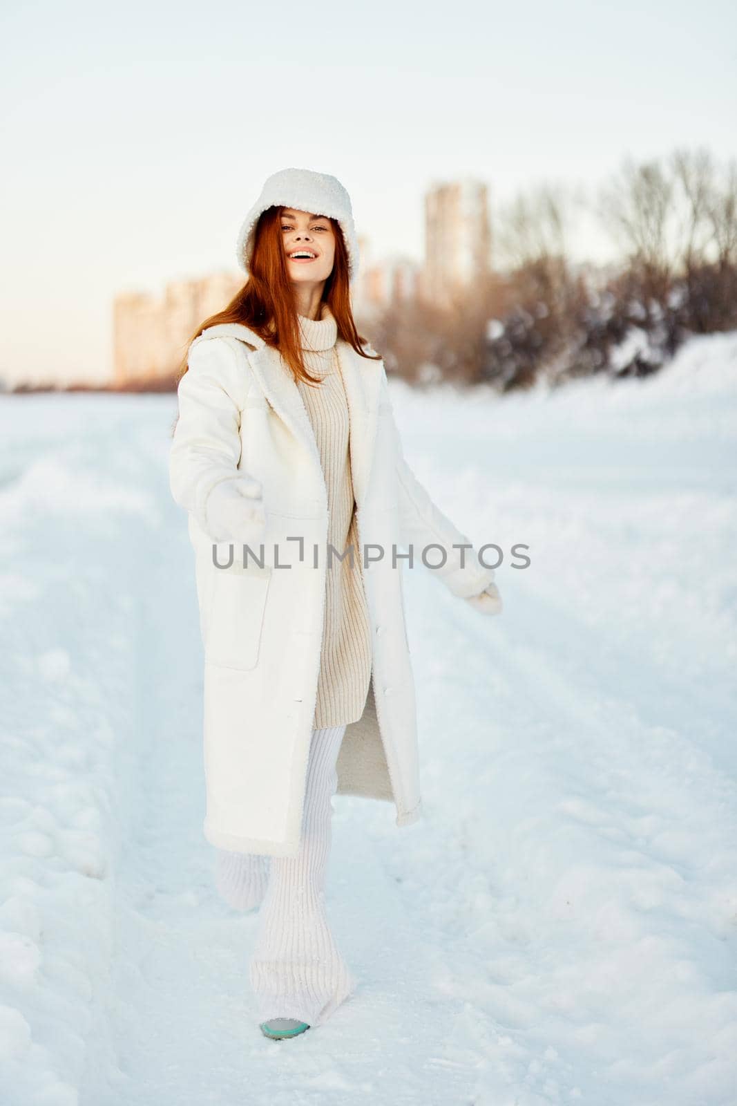 pretty woman winter weather snow posing nature rest Lifestyle. High quality photo