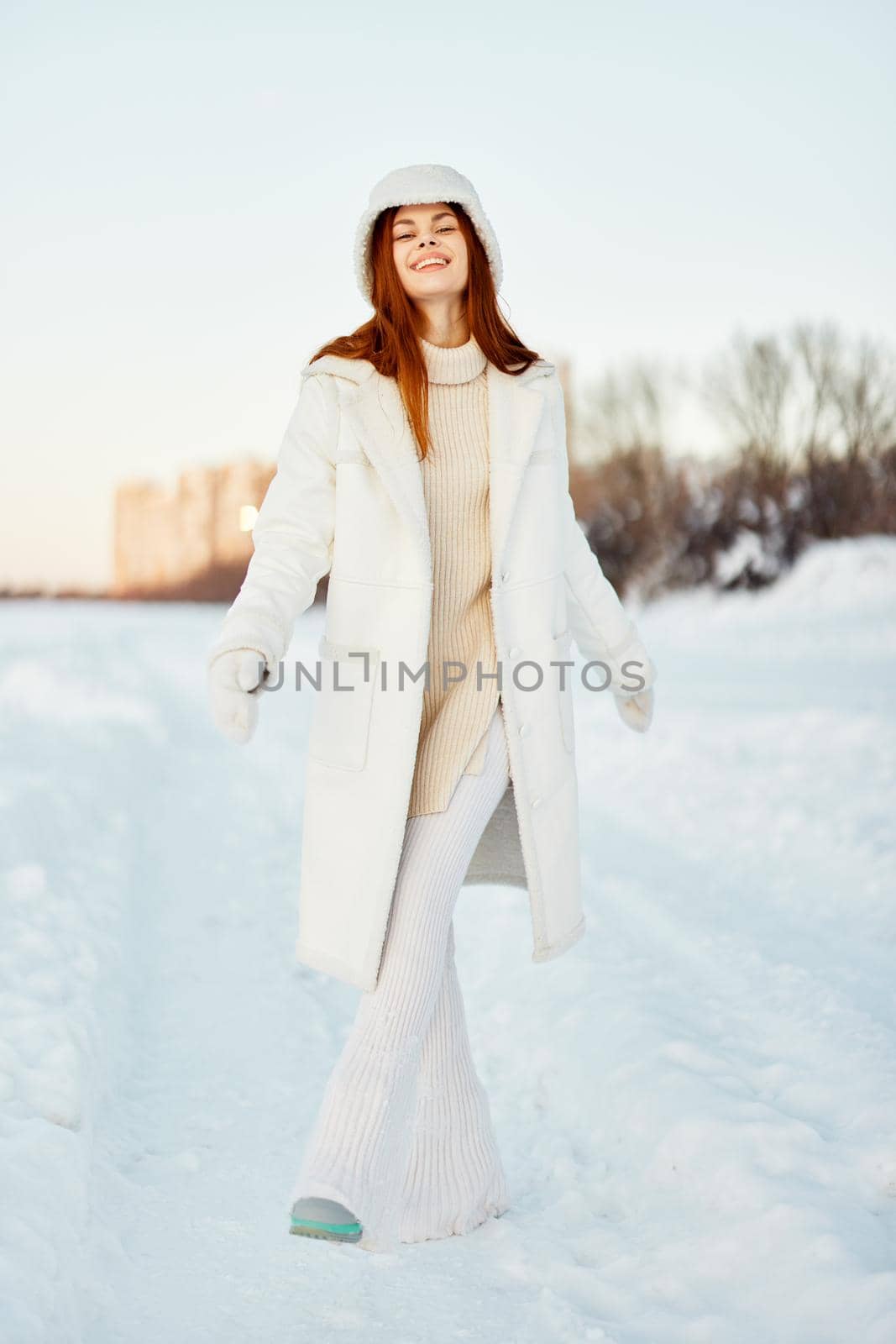 pretty woman winter clothes walk snow cold vacation Lifestyle. High quality photo