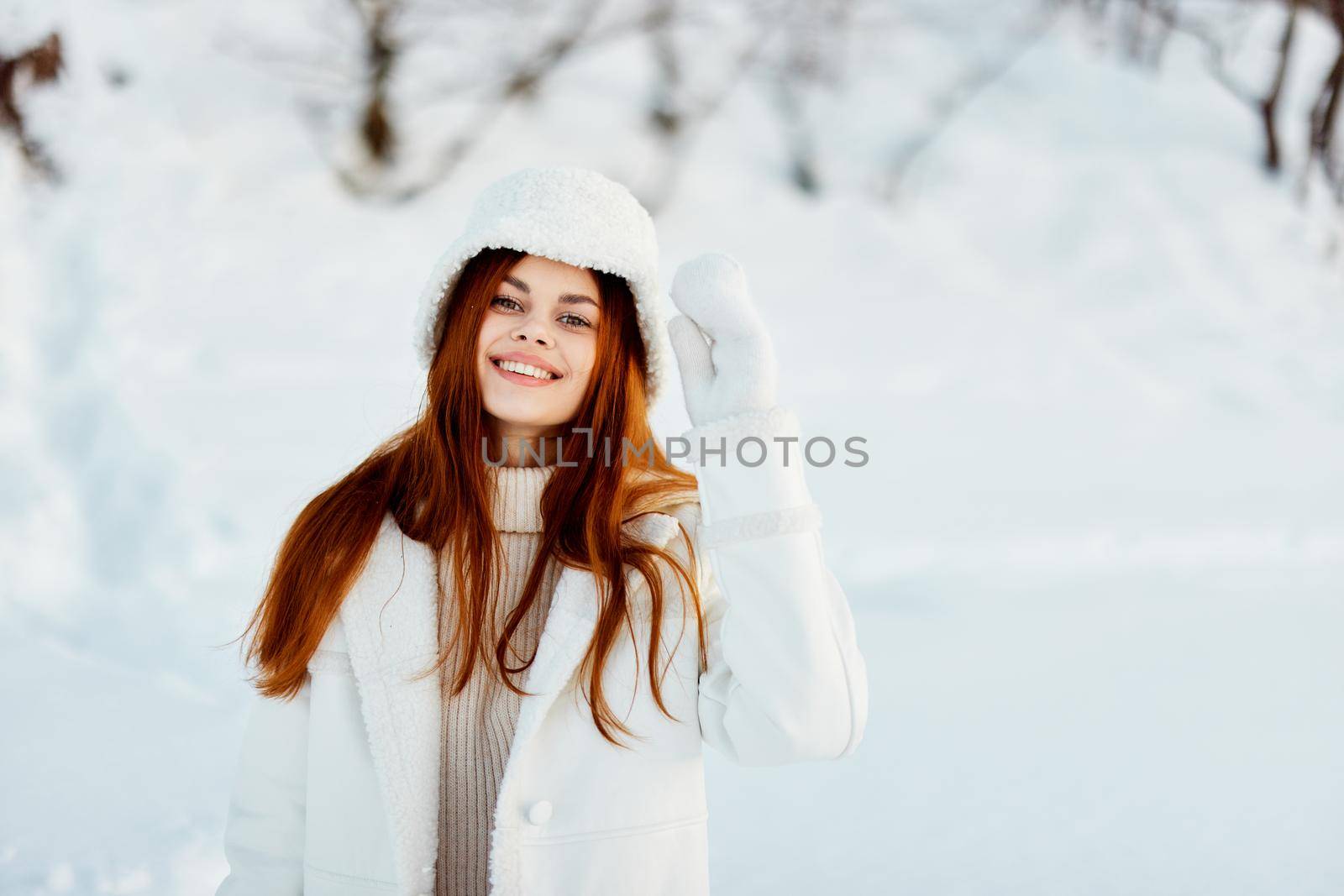 woman smile Winter mood walk white coat travel. High quality photo