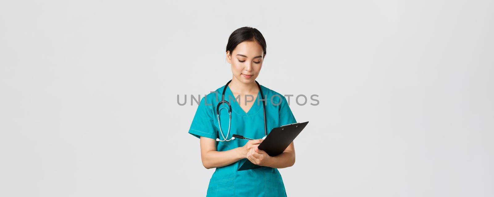 Healthcare workers, preventing virus, quarantine campaign concept. Serious-looking professional female doctor, nurse in scrubs writing down info on clipboard, examine patient, white background by Benzoix