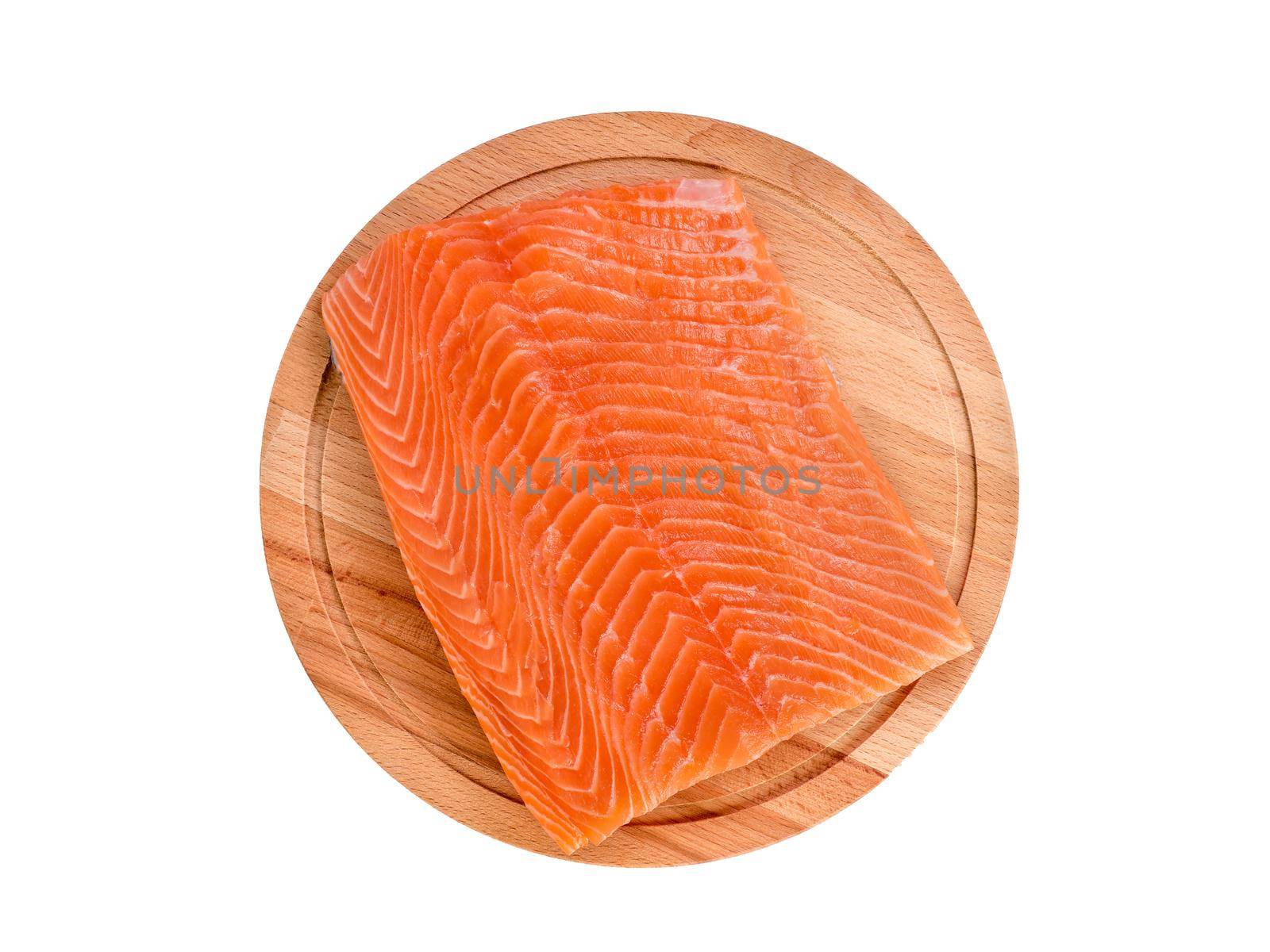 Fresh salmon fillet on wooden cutting board on white background, top view