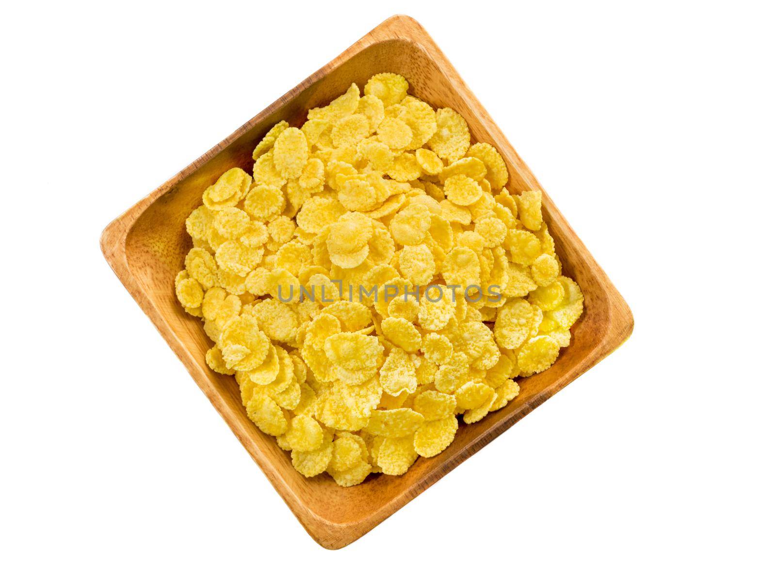 wooden bowl with dry cereal for breakfast, top view, white background