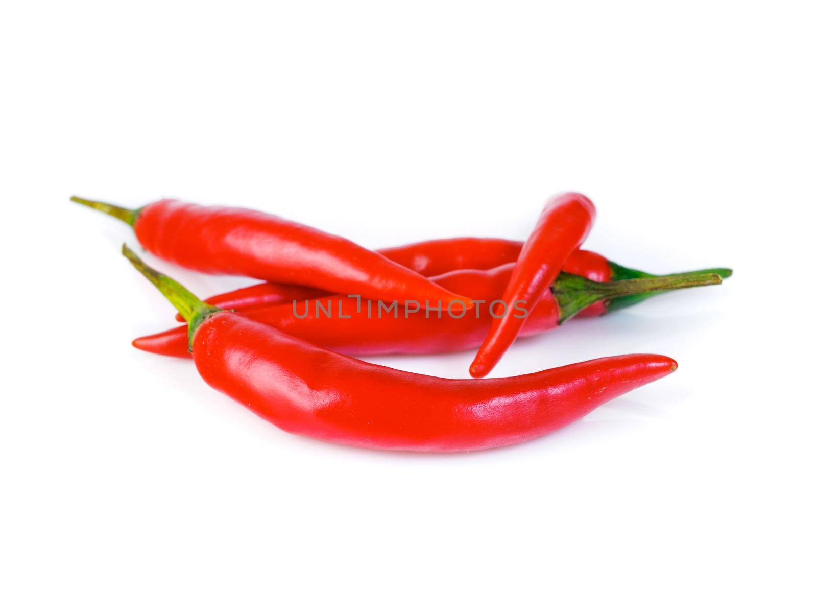 Red hot chili pepper on white background, side view by NataBene