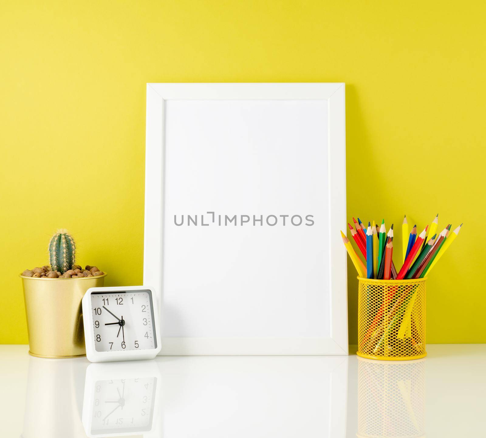 Mockup with clean white frame, colored pencils on the bright yellow background. Concept for creativity, drawing. by NataBene