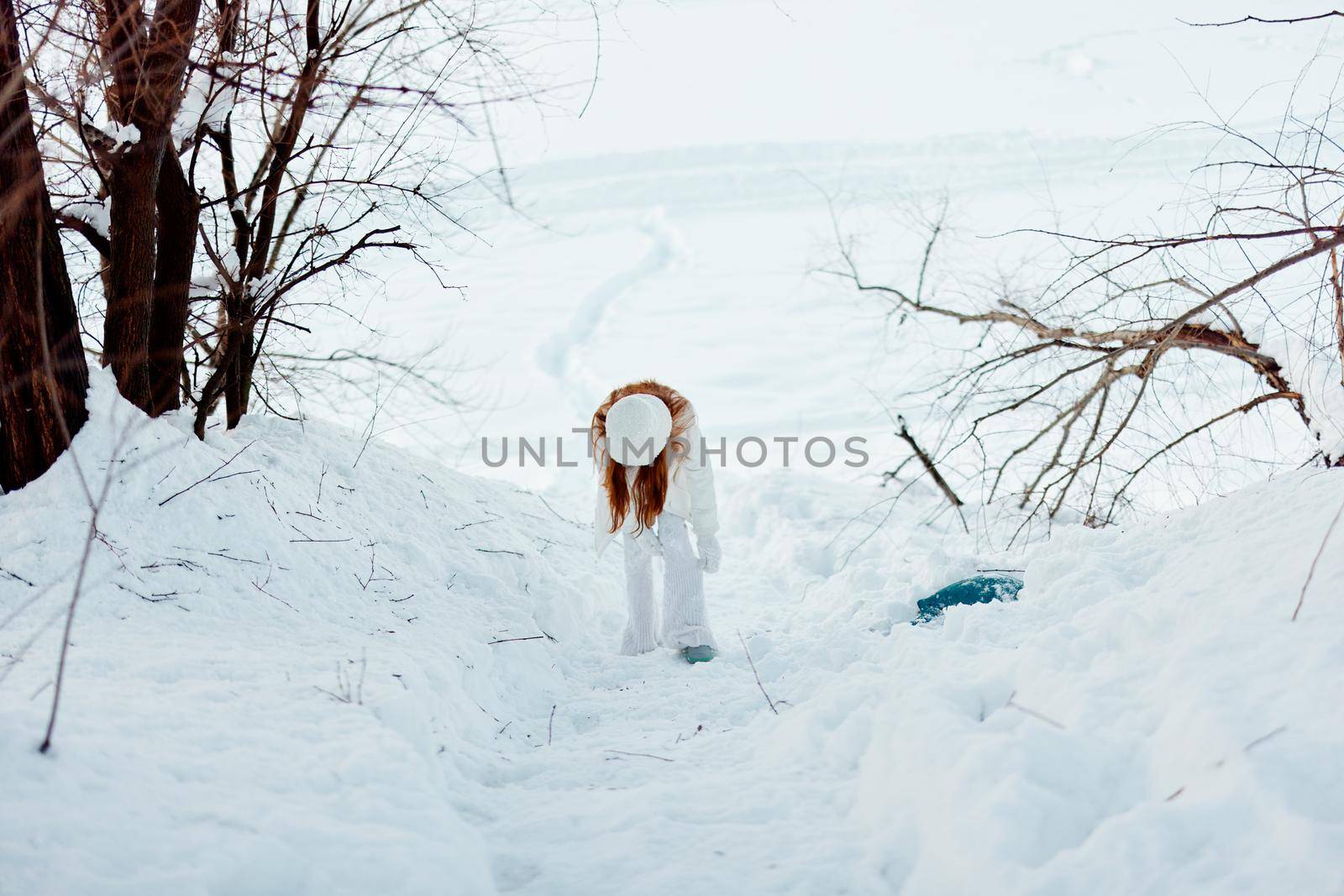 beautiful woman winter weather snow posing nature rest travel. High quality photo