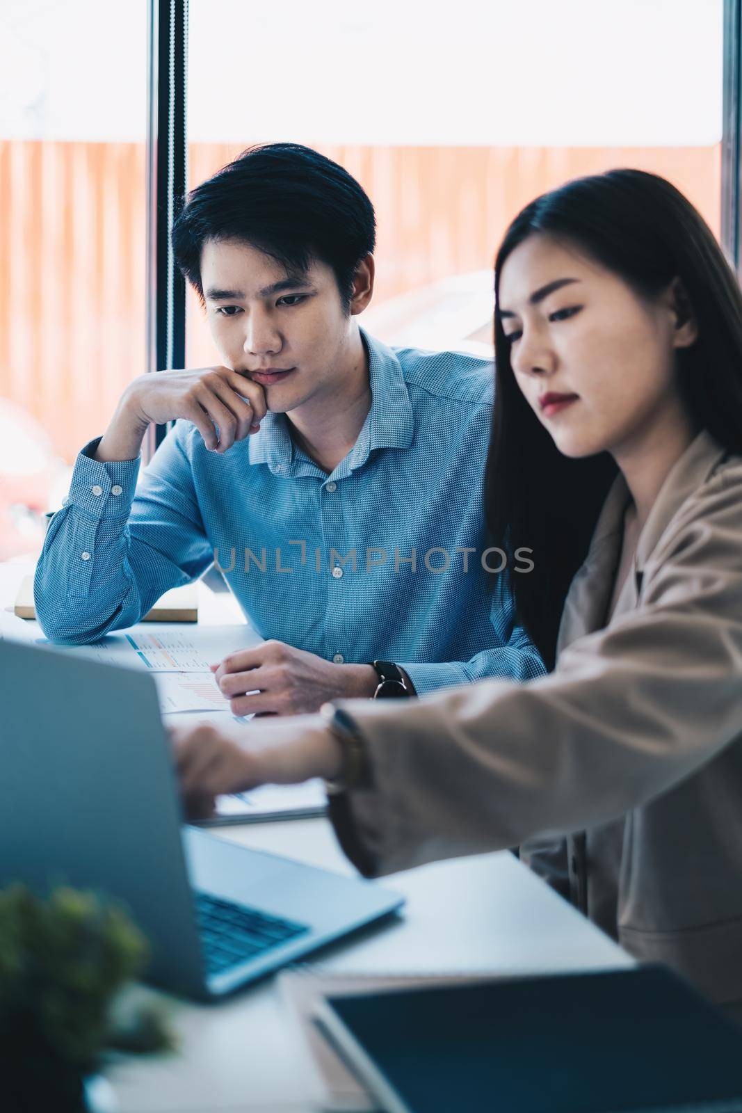 Group of Business people and Accountant checking data document on digital tablet for investigation of corruption account . Anti Bribery concept. by itchaznong