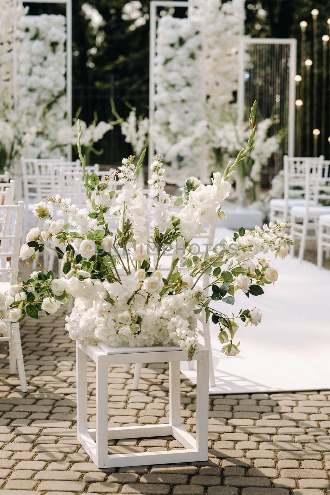 A place for a wedding ceremony on the street. Decorated wedding venue.