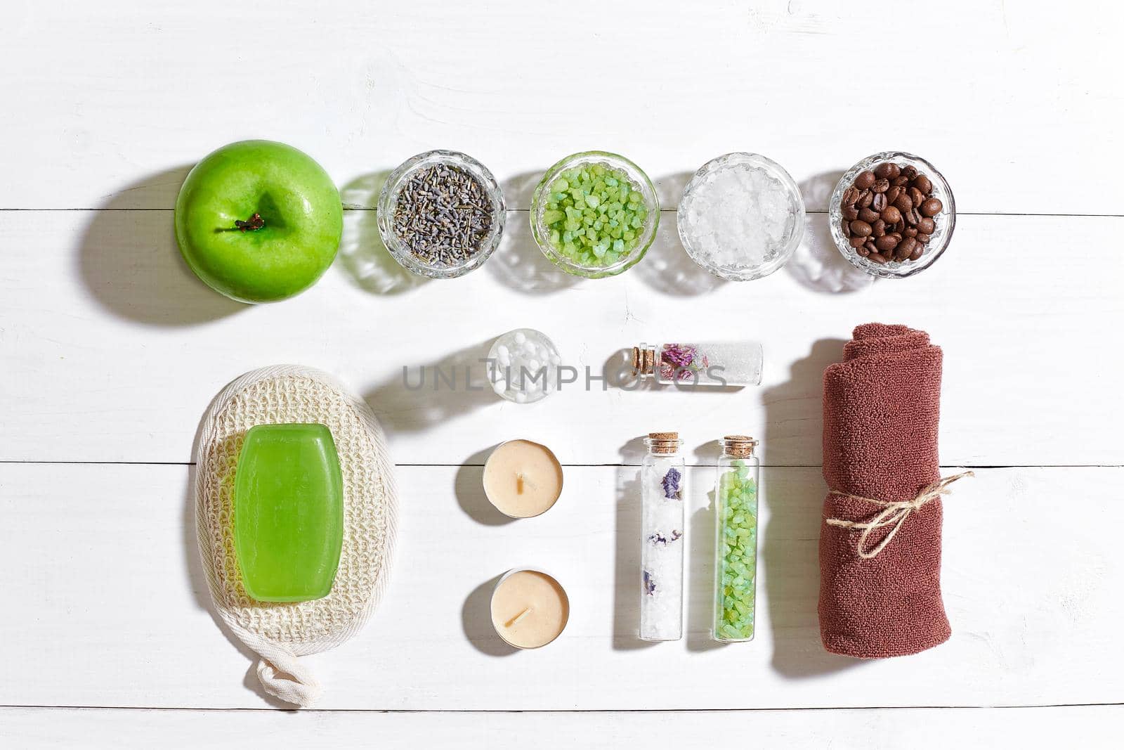 Composition of spa treatment on white wooden table with space for text. Top view. Still life. Flat lay