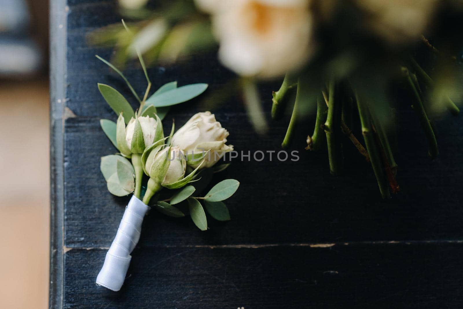 Wedding bouquet of roses lying on the surface. Wedding floristry.