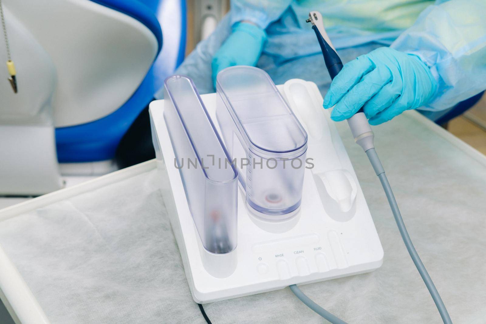 Ultrasonic scaler in the dental office. Dentistry Concept.