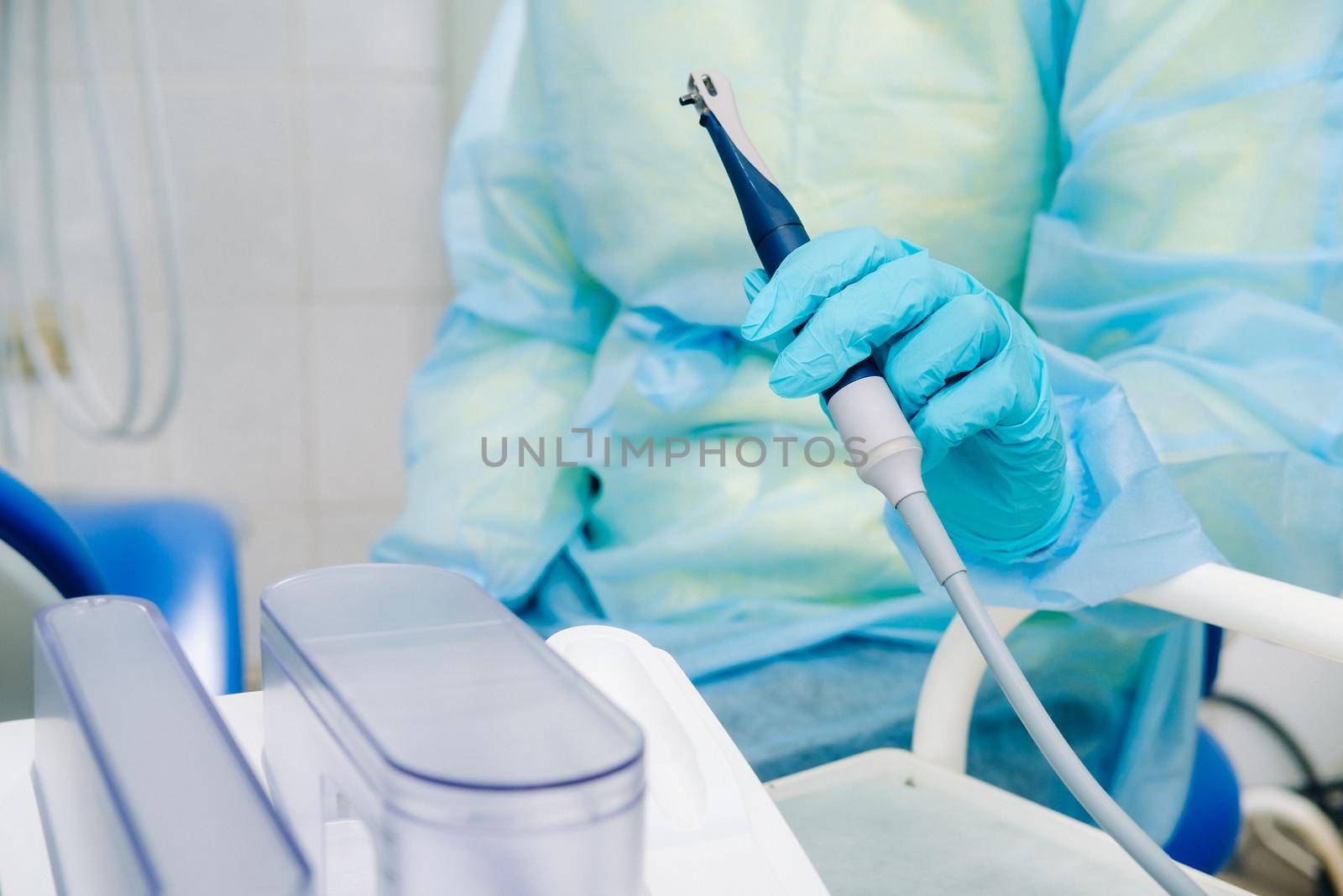 Ultrasonic scaler in the dental office. Dentistry Concept.