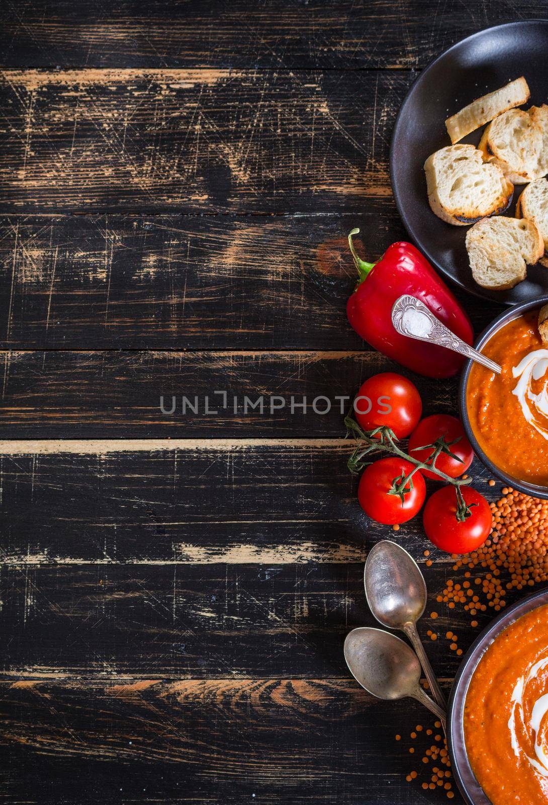 Pumpkin soup with heavy cream background by its_al_dente