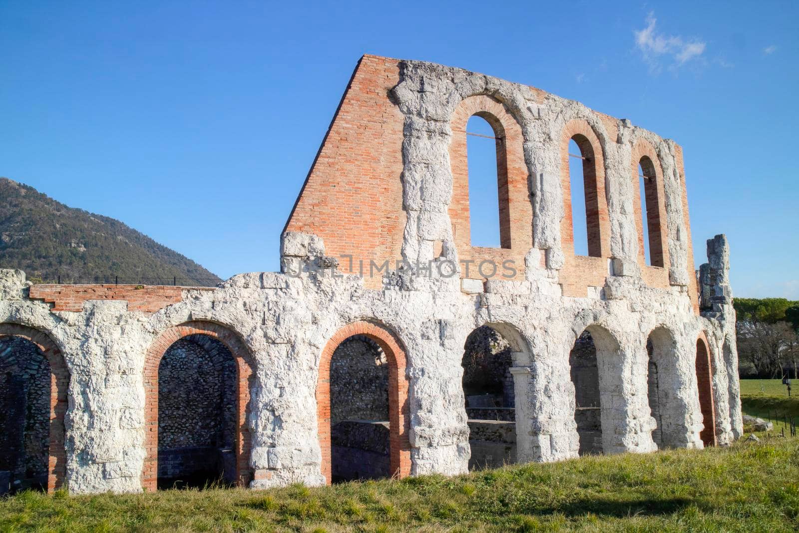 The remains of the Roman amphitheater in Gubbio Italy  by fotografiche.eu