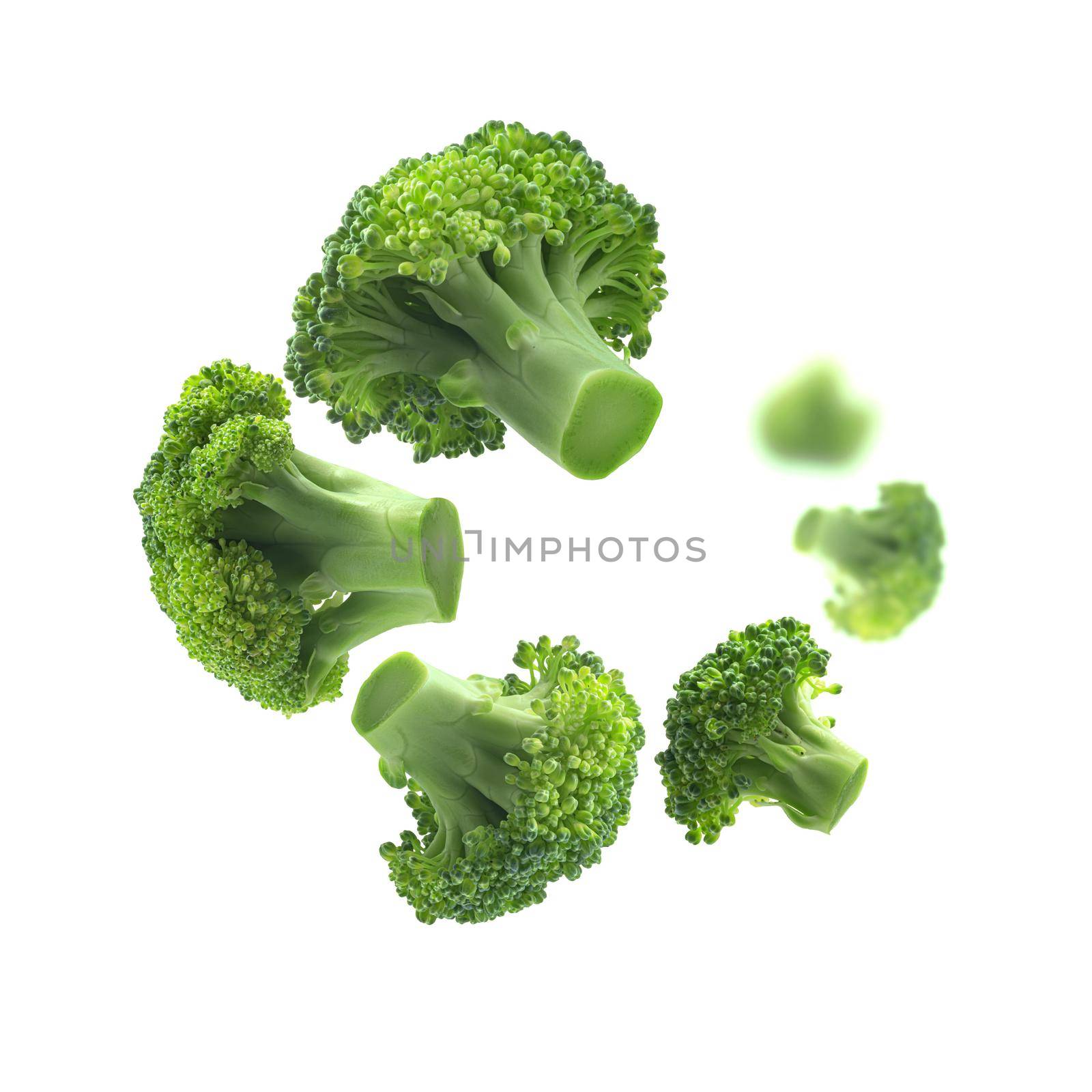 Green broccoli levitating on a white background by butenkow