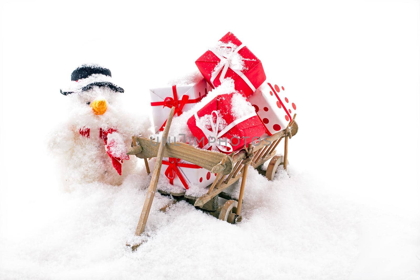 Christmas man with a wooden cart full of gifts in the snow by devy