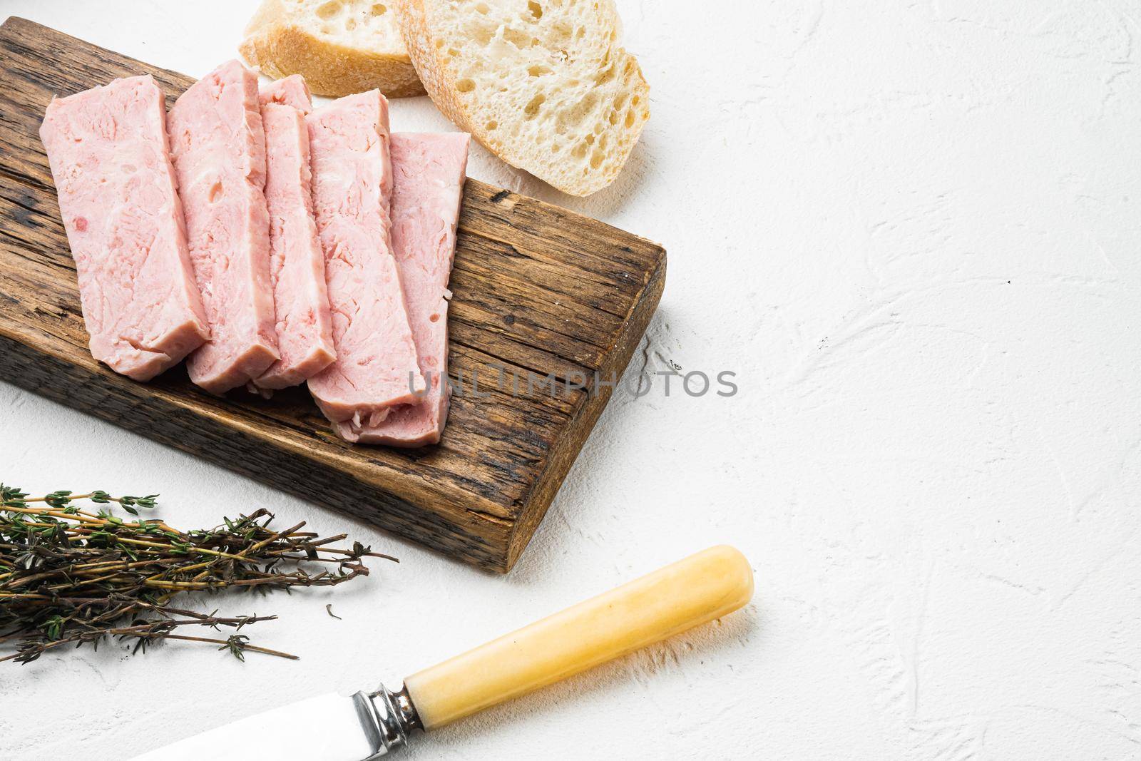 Cooked Ham from the can bread sandwich set, on white stone table background, with copy space for text