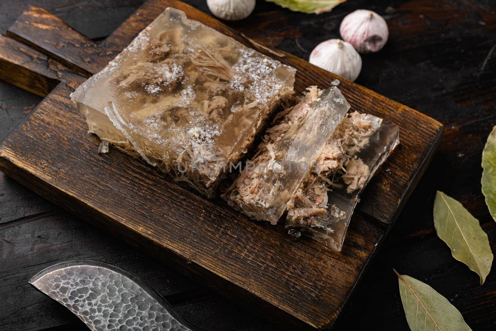 Aspic meat set, on black wooden table background