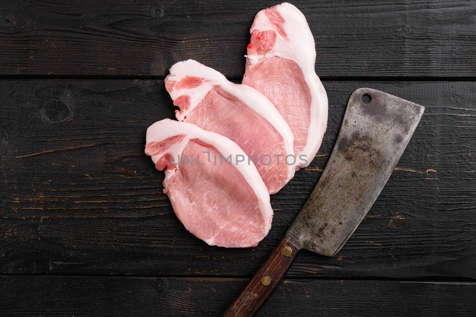 Meat steak set, on black wooden table background, top view flat lay, with copy space for text