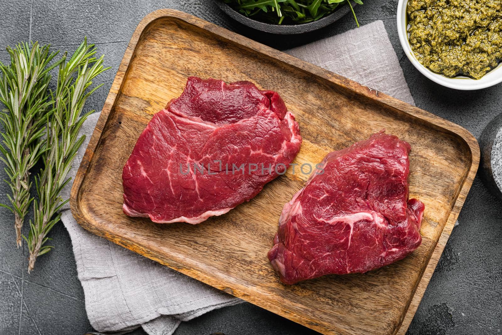 Fresh raw Beef meat Rump Steak, on gray stone table background, top view flat lay by Ilianesolenyi