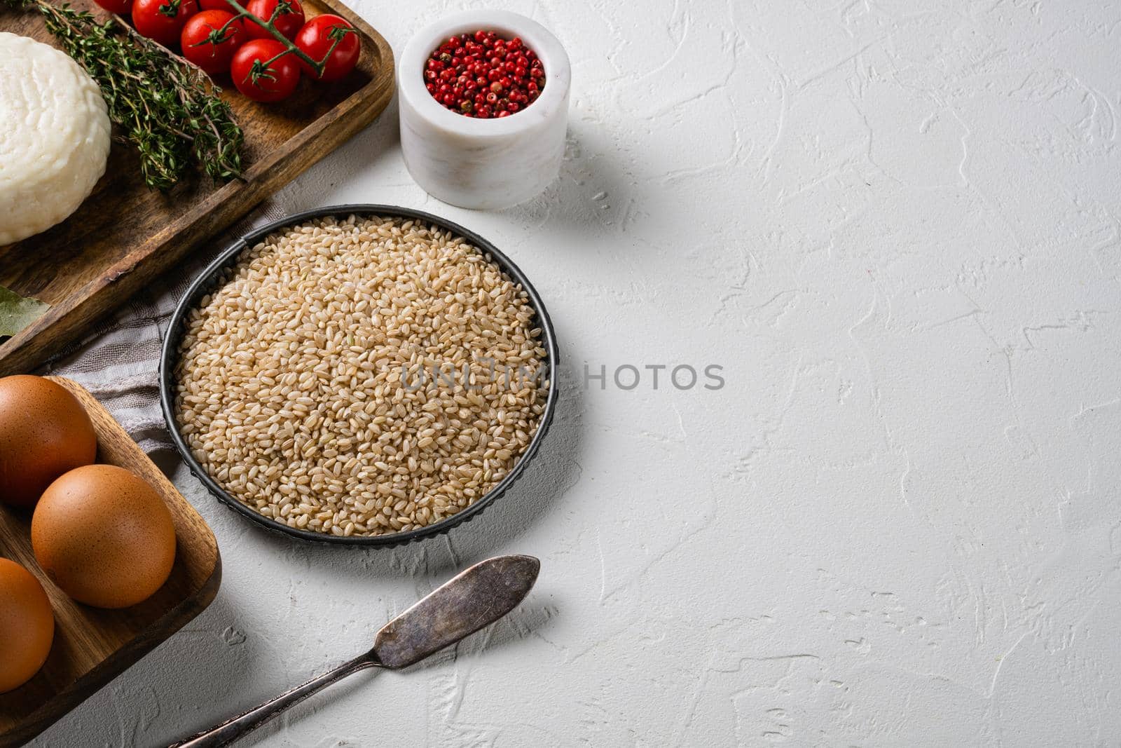 Healthy Organic Tofu and Rice Buddha Bowl ingredients set, on white stone table background, with copy space for text