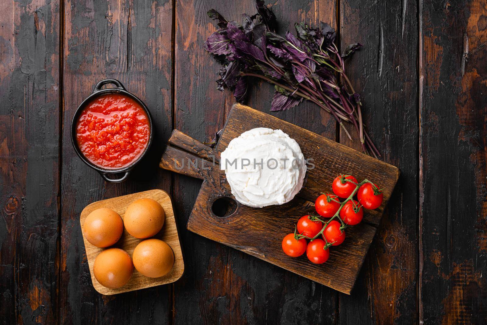 Homemade Ricotta cheese set, on old dark wooden table background, top view flat lay