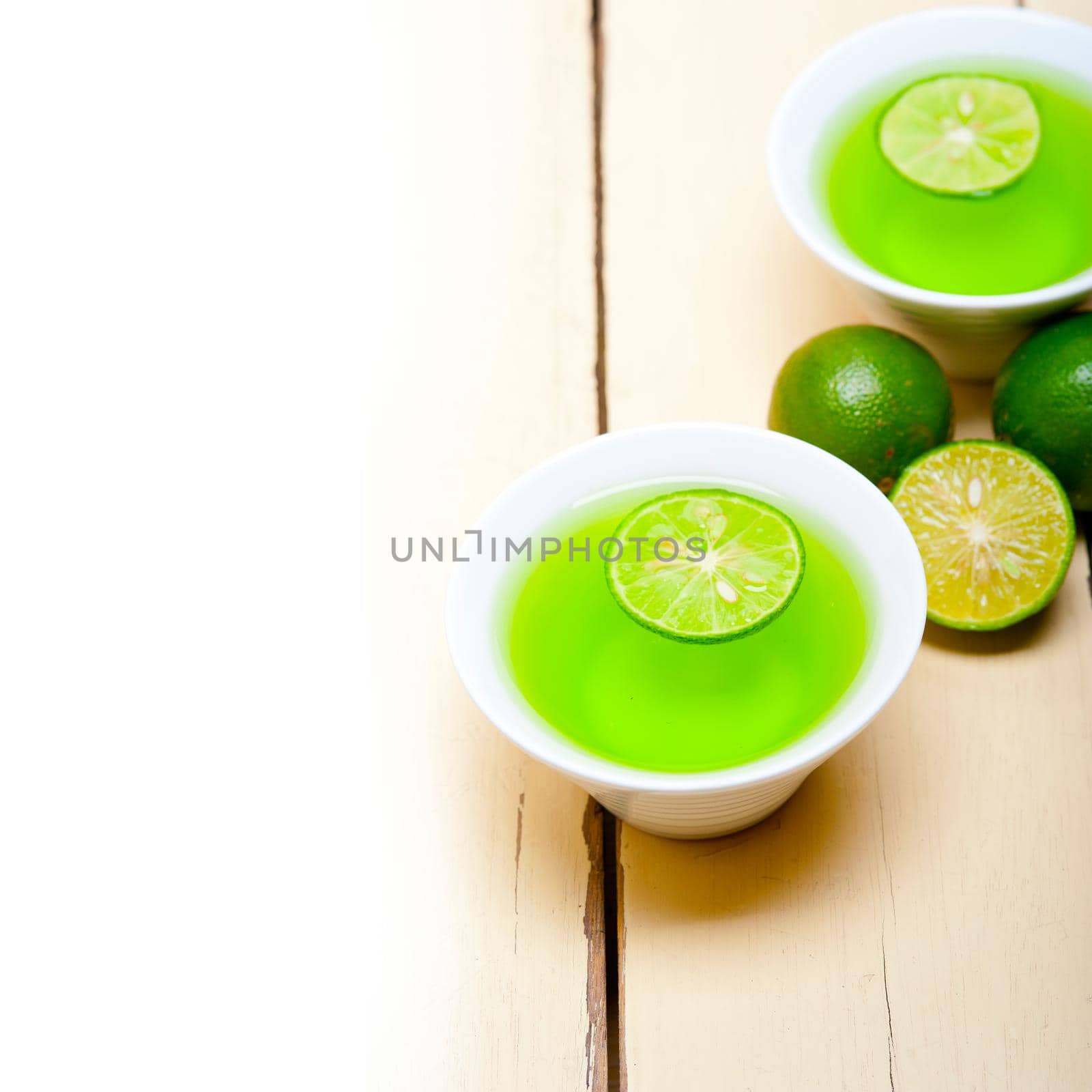 fresh and healthy green lime lemonade macro closeup 