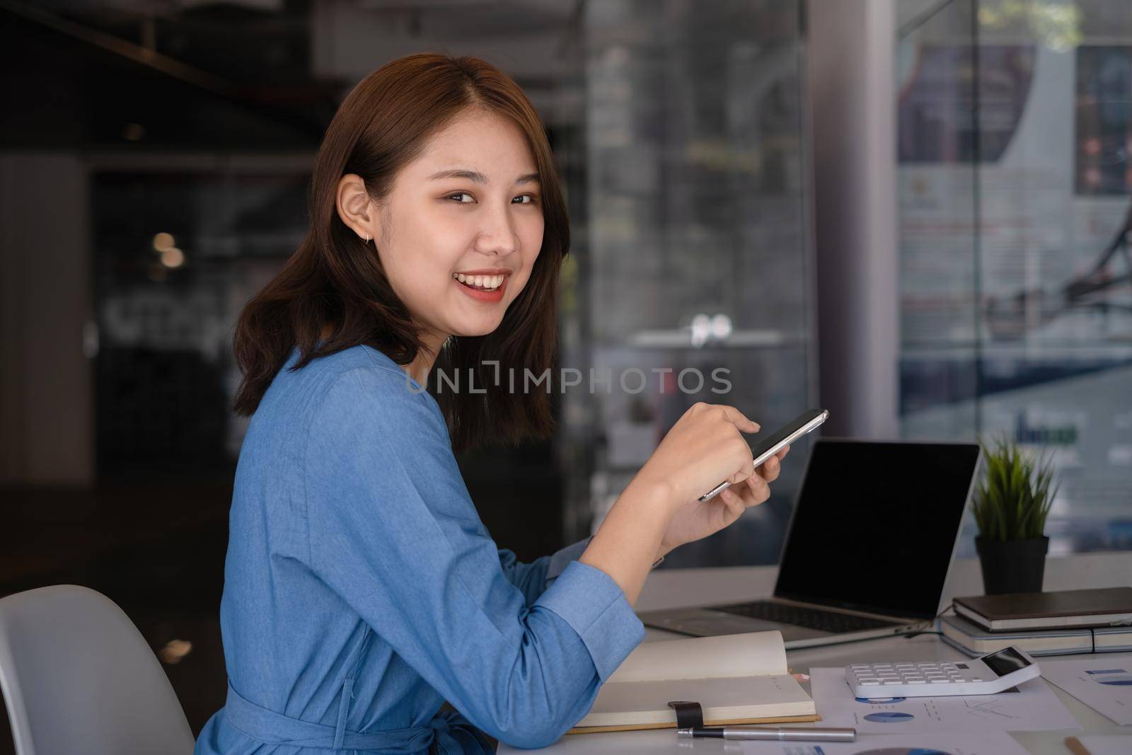 A businesswoman completes KYC using an online banking program in order to open a digital savings account. The definition of cyber security. by itchaznong