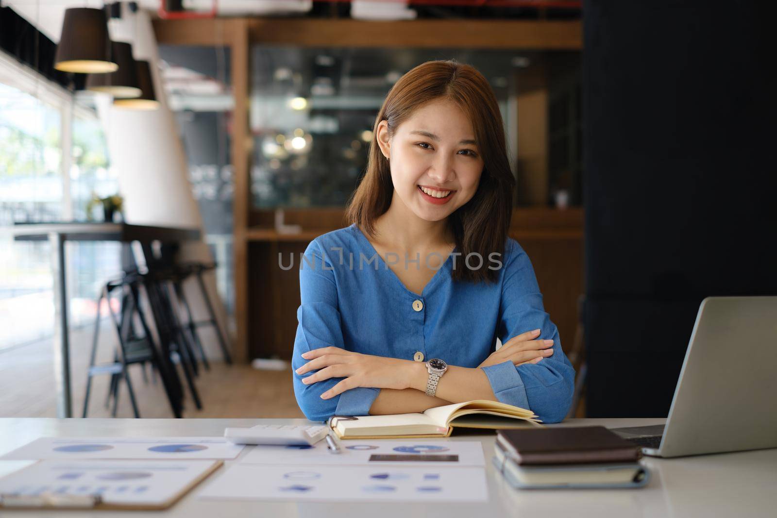 Asian Business Woman or Accountant with paperwork on desk, account, audit and saving concept