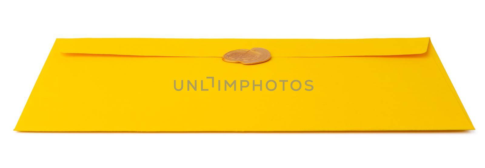 yellow envelope isolated on white background. top view