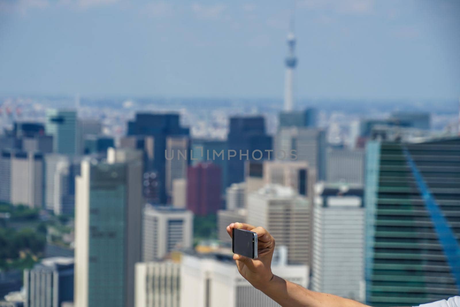 Tokyo Sky Tree and Smartphone. Shooting Location: Tokyo metropolitan area
