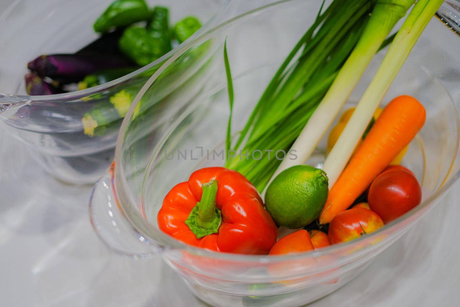 Green and yellow vegetables placed in a wine cooler by kanzilyou
