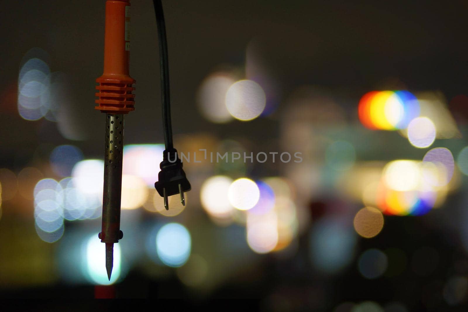 Solder and urban night view. Shooting Location: Tokyo metropolitan area