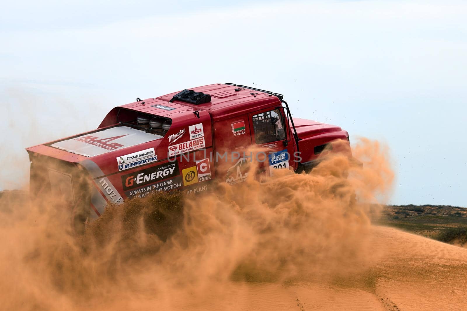 Sports truck MAZ Sport-auto team gets over the difficult part of the route during the Rally raid in sand. THE GOLD OF KAGAN-2021. 26.04.2021 Astrakhan, Russia by EvgeniyQW
