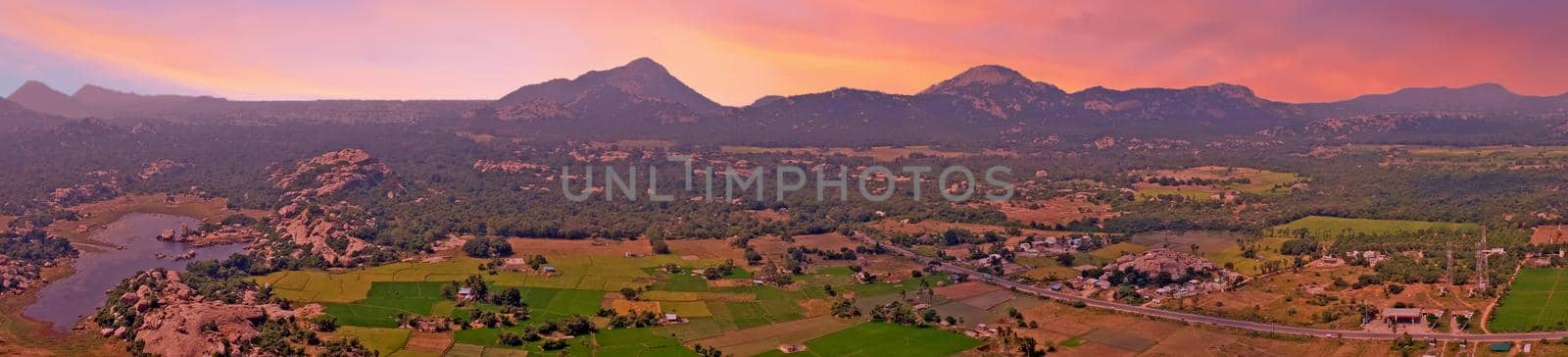 Panoramic view from Gingee Fort, Thiruvannamalai in Tamil Nadu India at sunset
Known as the "Troy of the East" by the British, Gingee Fort rises out of the Tamilian plains. Lying in Villupuram District of Tamil Nadu in India