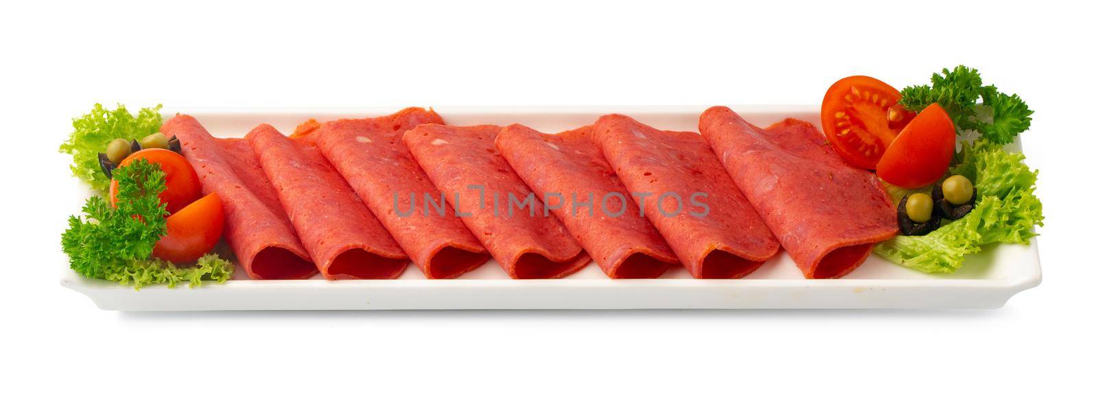 Cold smoked meat plate with salad leaves isolated on white background