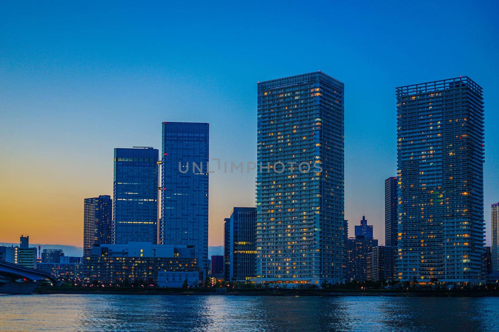 Sunset view with high-rise apartment group in Chuo-ku, Tokyo. Shooting Location: Tokyo metropolitan area