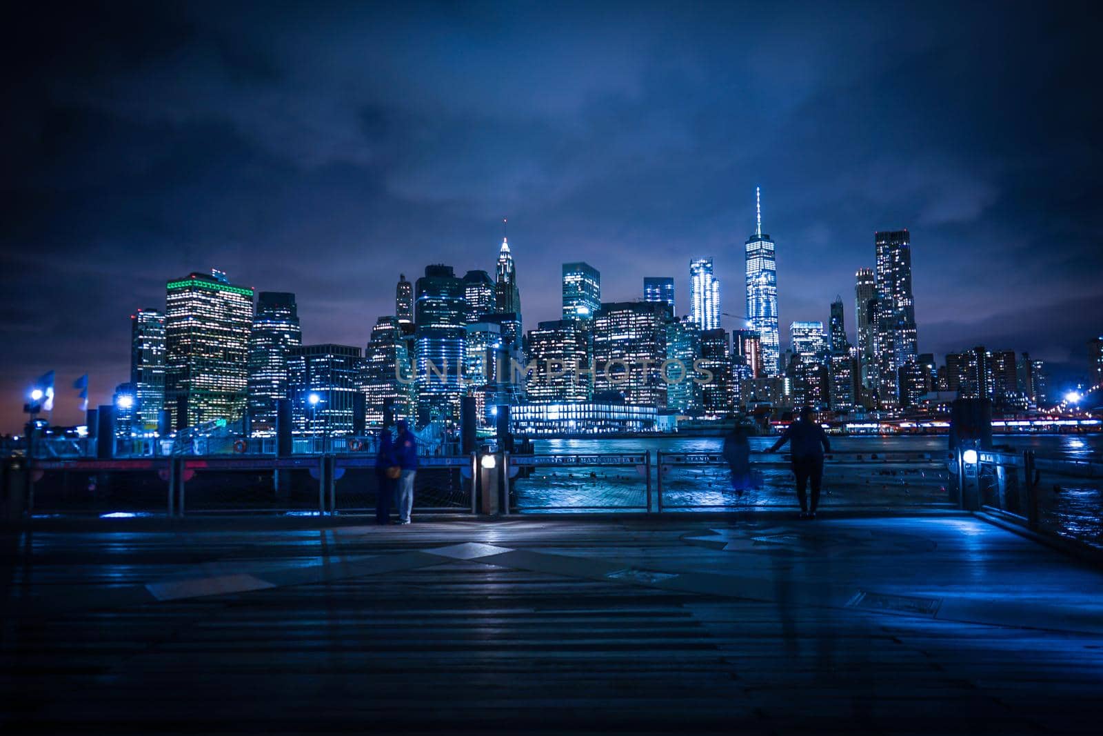 Night view and people of Manhattan and Brooklyn Bridge. Shooting Location: New York, Manhattan