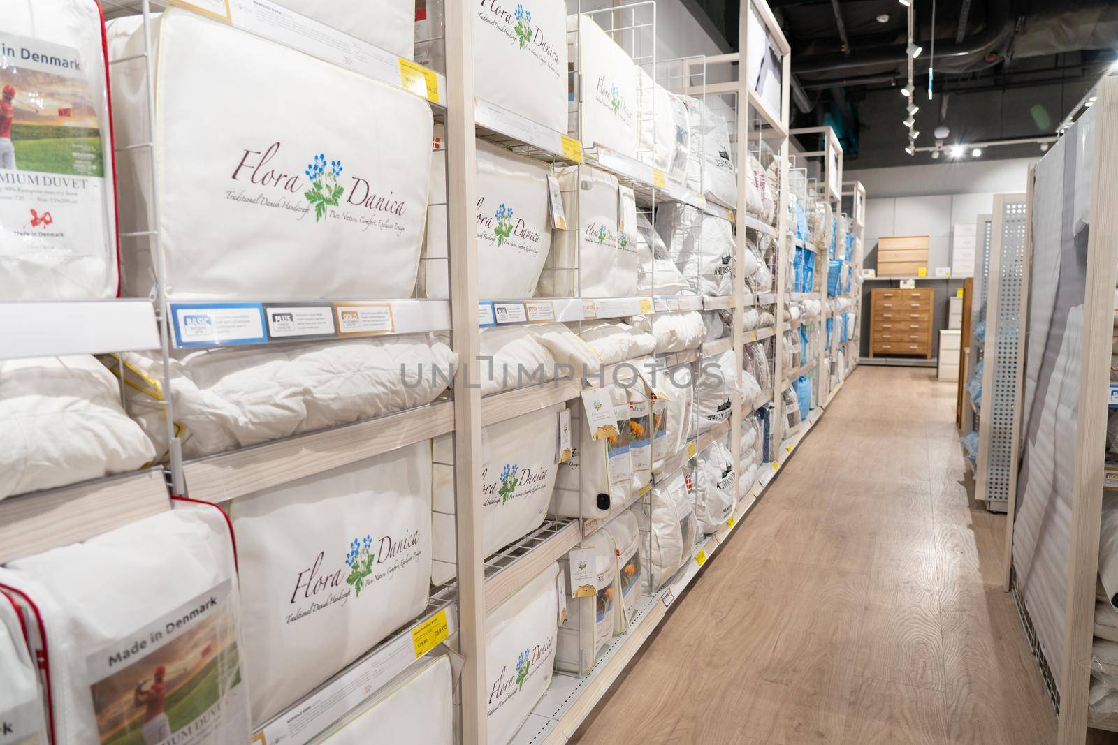 Grodno, Belarus - April 07, 2021: Interior of JYSK store in mall Triniti. Department for the sale of linen.