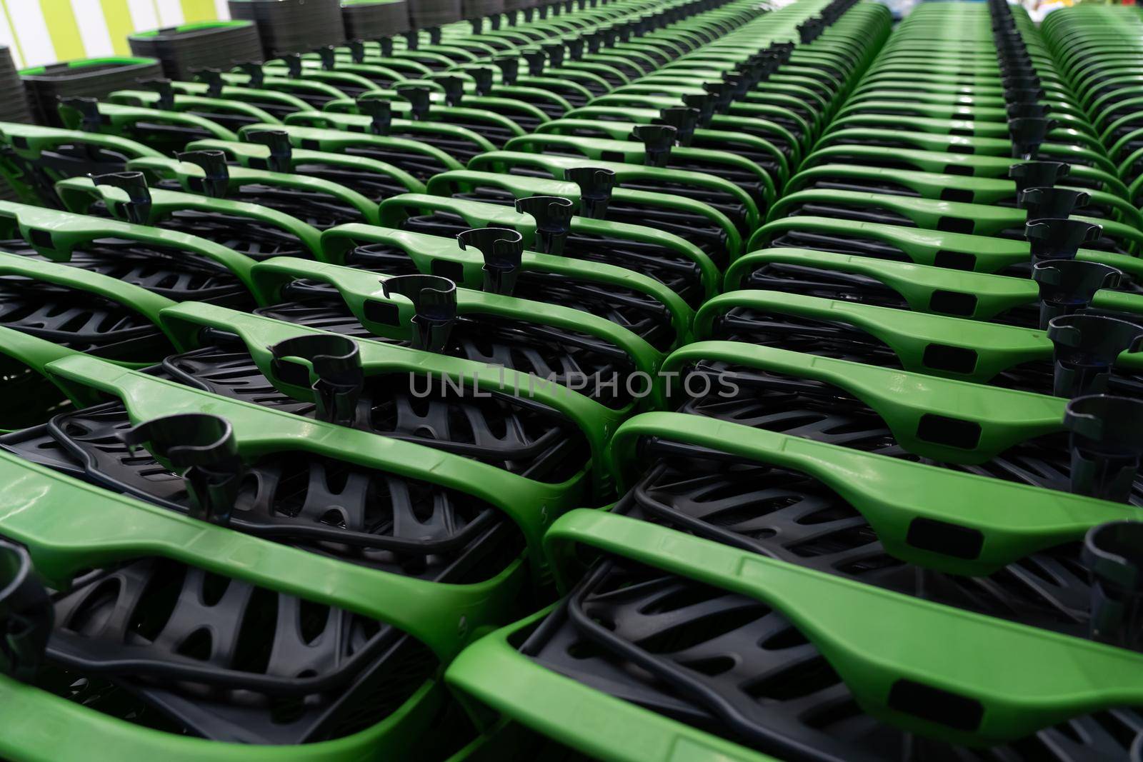 Shopping carts in a hypermarket close-up. Extremely shallow depth of field, selective focus.