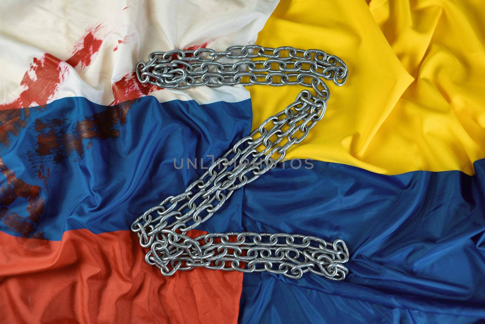 flags of russia and Ukraine with a metal chain by Rotozey
