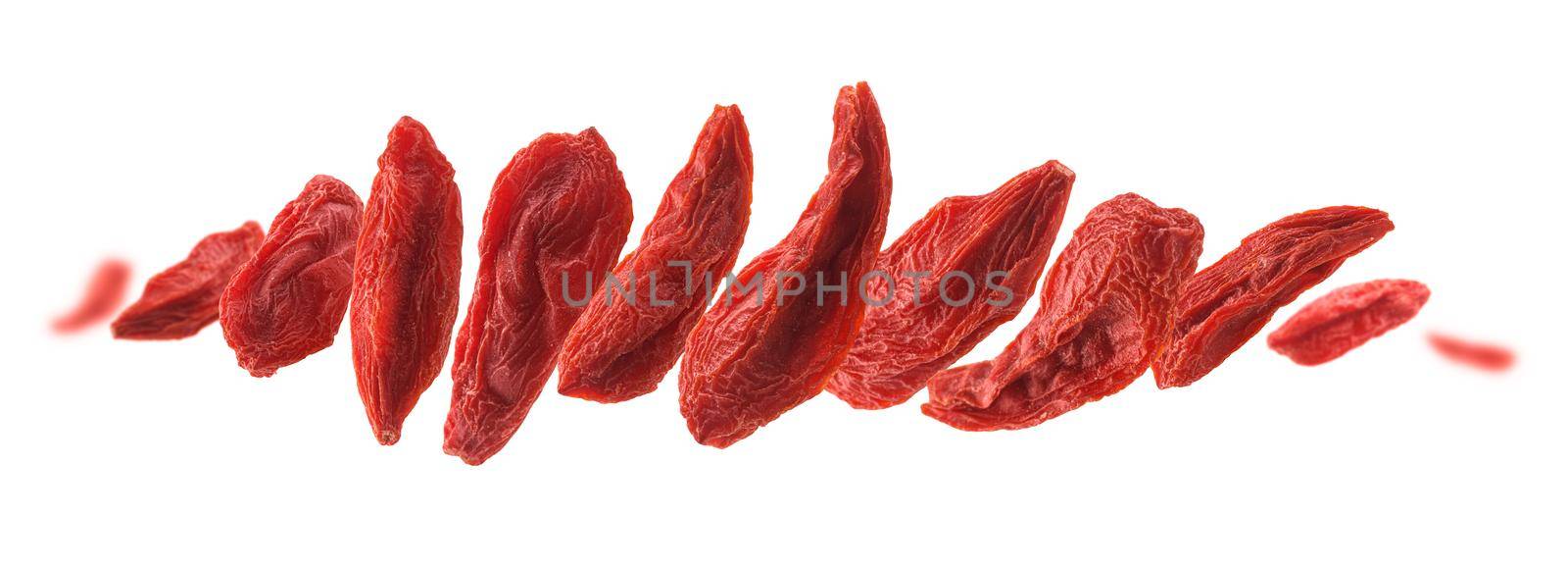Dry Goji berries levitate on a white background by butenkow