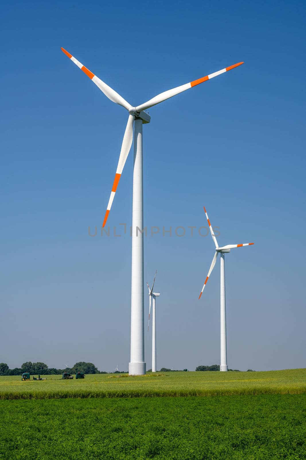 Modern wind turbines on a sunny day seen in Germany