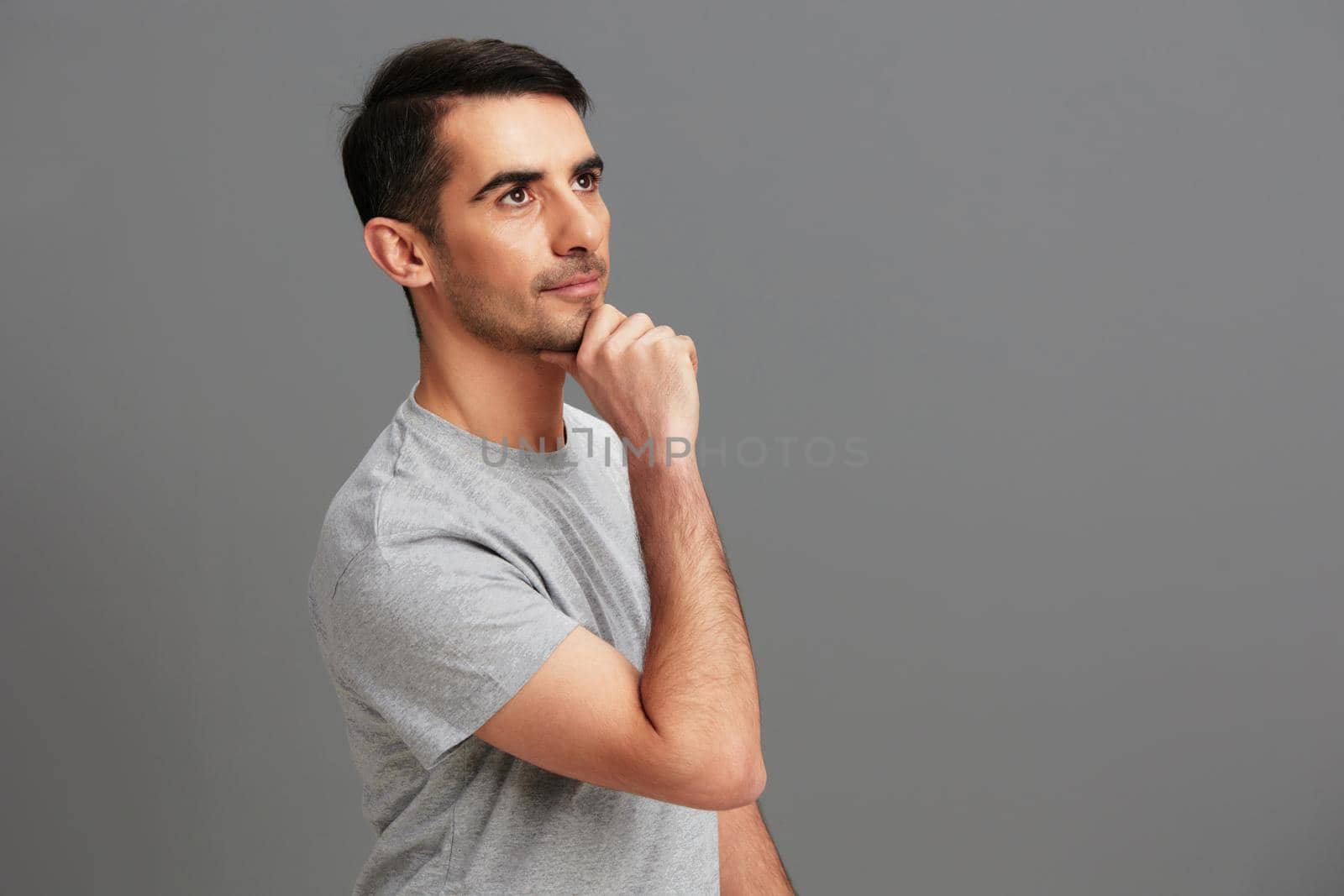 man posing lifestyle smile studio isolated background. High quality photo