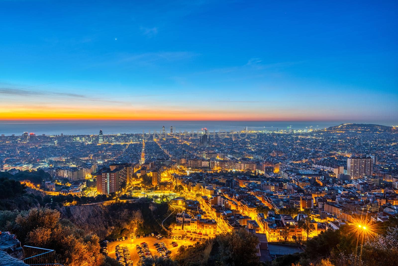 The skyline of Barcelona before sunrise by elxeneize
